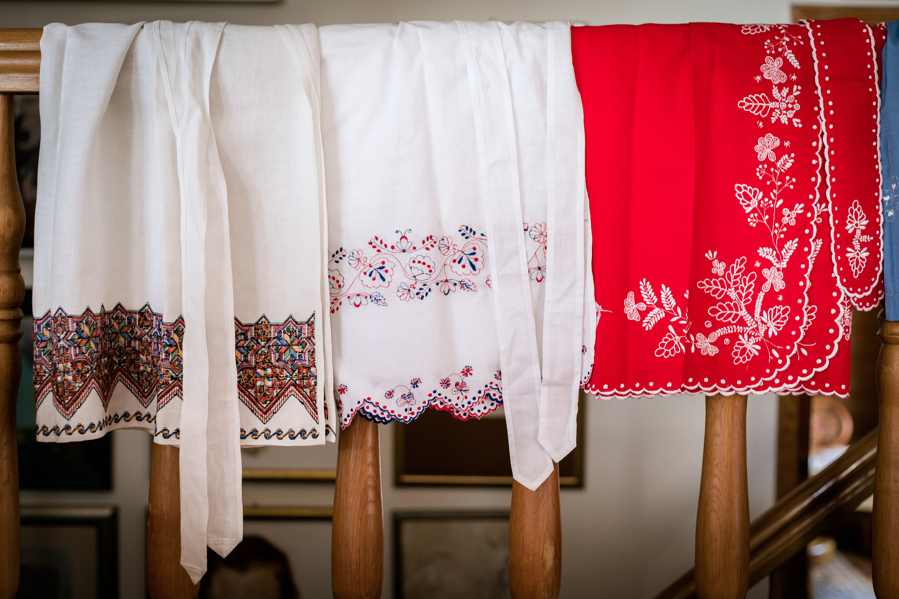 Aprons, from the left: the Lemko embroidery, the Rzeszow embroidery in the middle, the Kuyavia embroidery on the right.